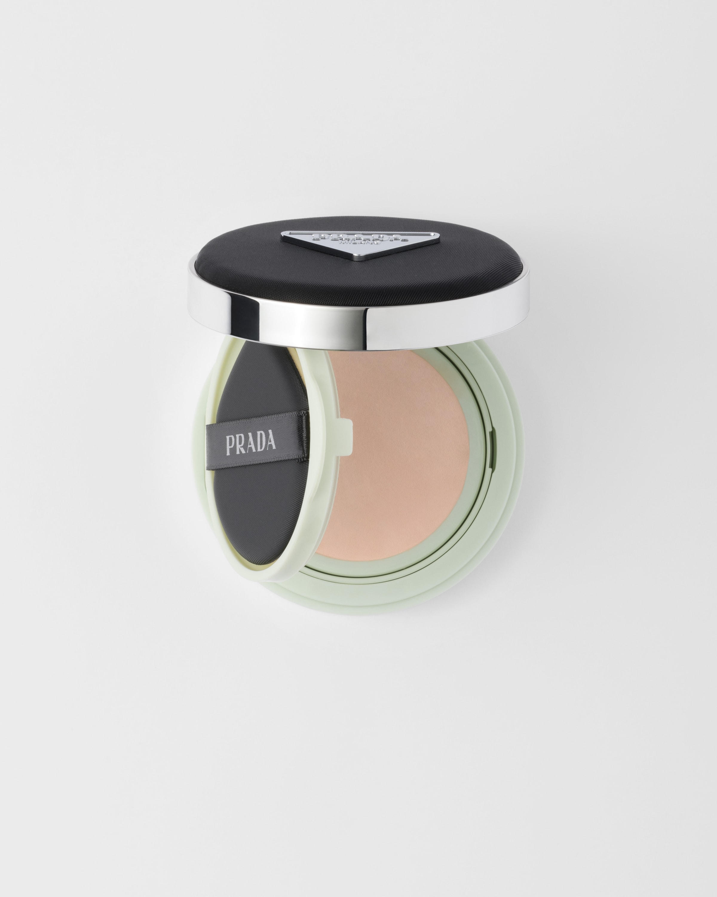 

Тональная основа в кушоне Prada Reveal Mesh - LN25 - Светлый нейтральный, бежевый