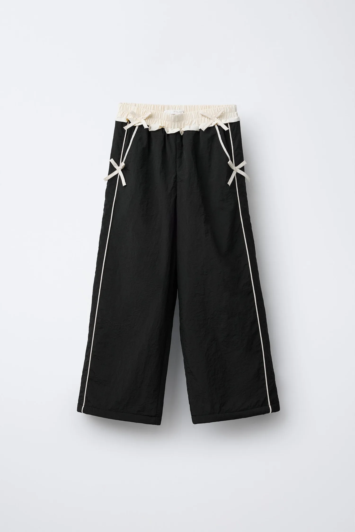 Нейлоновые брюки с флисовой подкладкой и бантиками Zara, черный
