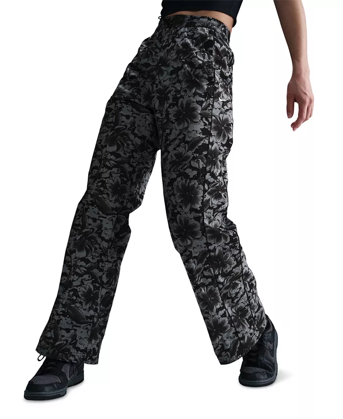 

Спортивная одежда для женщин: брюки Windrunner Women's UV Woven Printed Nike, черный