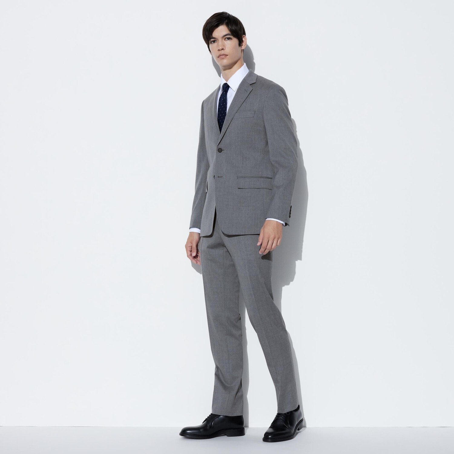 

Брюки UNIQLO зауженные из эластичной шерсти, серый
