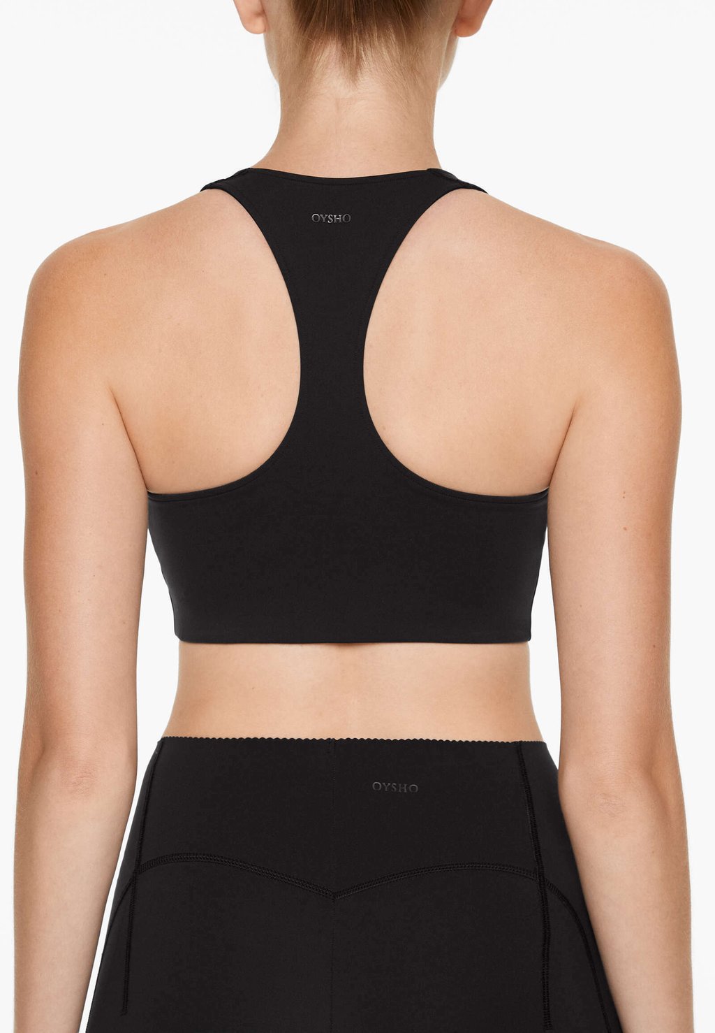 

Спортивный бюстгальтер средней поддержки COMPRESSIVE WITH TRIM OYSHO, черный