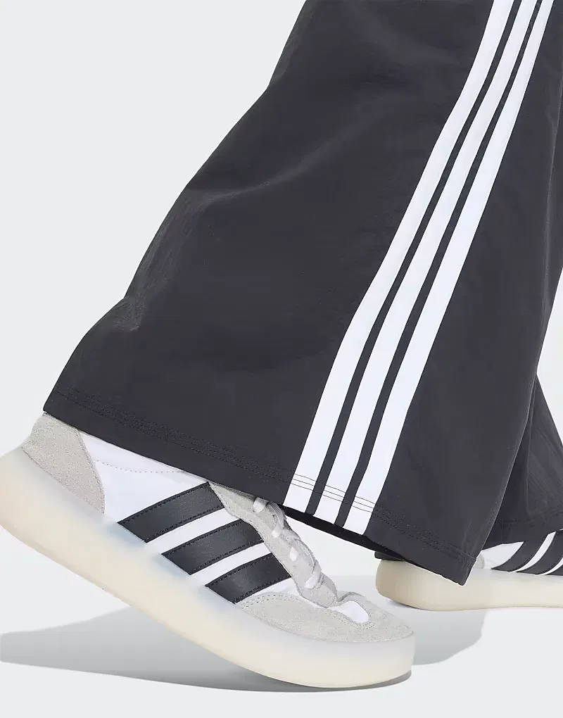 Культовые спортивные брюки Adidas Sportswear с широкими штанинами и эластичными вставками, черно-белые — фото 3