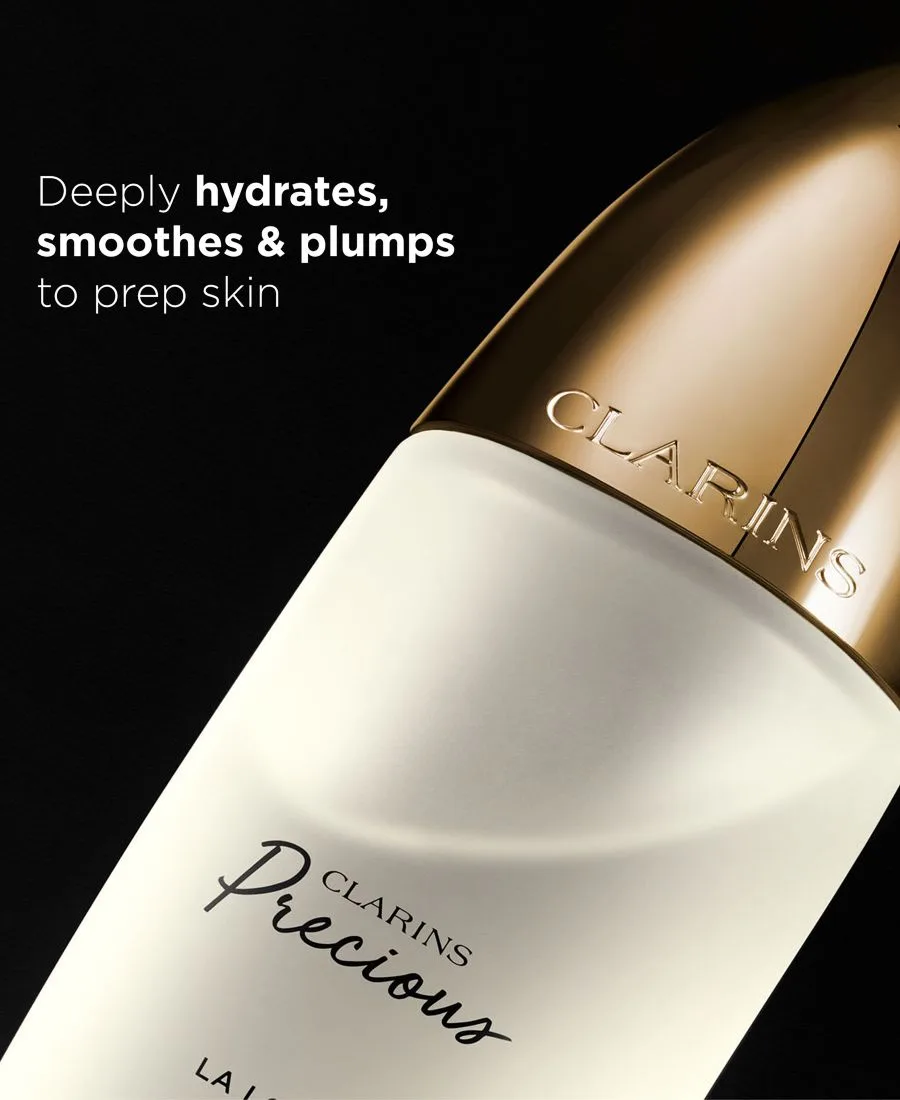 Эссенция Clarins — Precious La Age-Defying Treatment Essence, 140 мл — фото 2