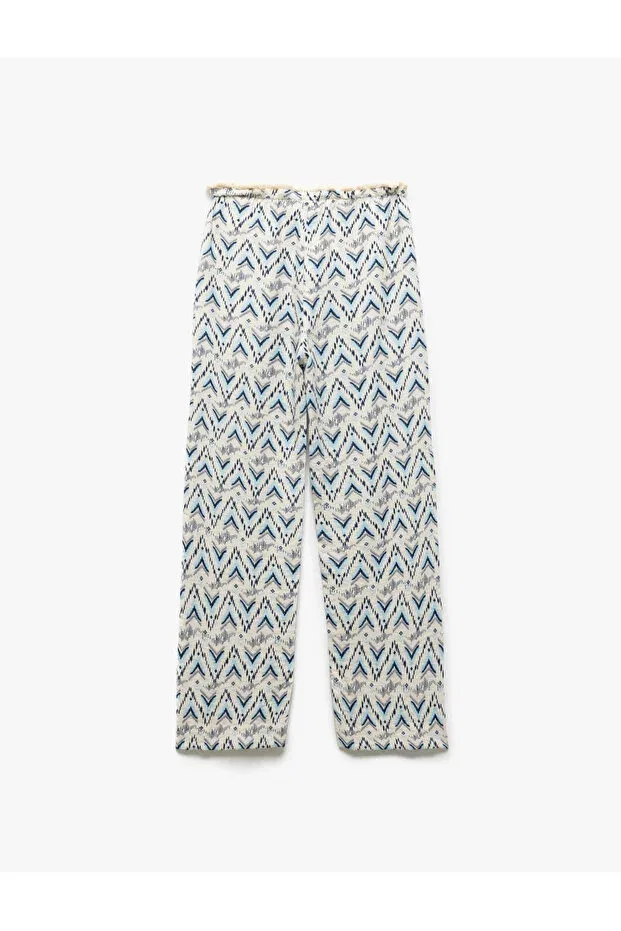 Детские брюки для девочек с принтом Viscose laced waist patterned straight leg trousers Koton, Blue Patterned — фото 2