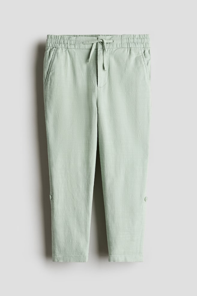 

Подвернутые хлопковые брюки-чинос H&M, зеленый