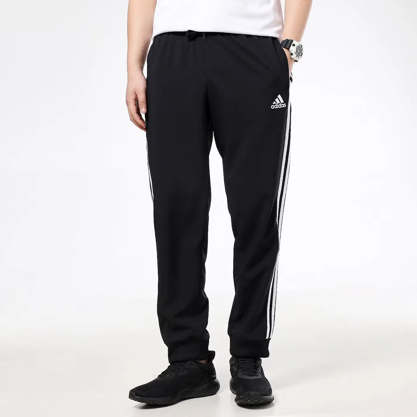 Брюки спортивные с боковыми полосками и зауженным низом Adidas, черный — фото 2