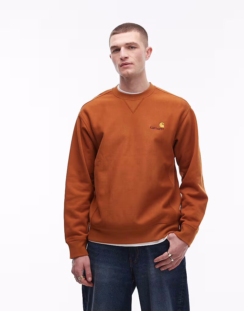 

Толстовка Carhartt WIP American Script в цвете «жженый оранжевый»