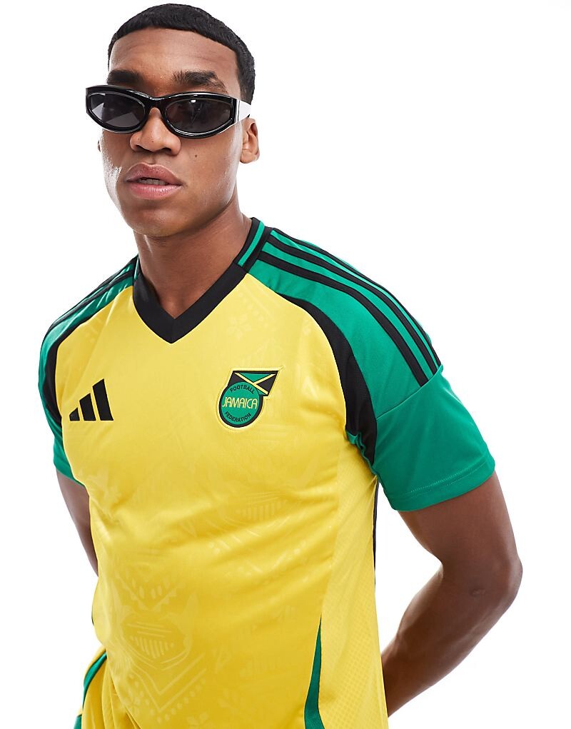 

Желтая домашняя футболка унисекс adidas Football Jamaica 2024/2025