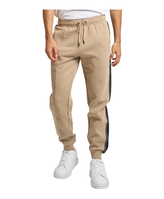 

Бежевые спортивные брюки из смесовой хлопковой ткани с логотипом. Guess, бежевый