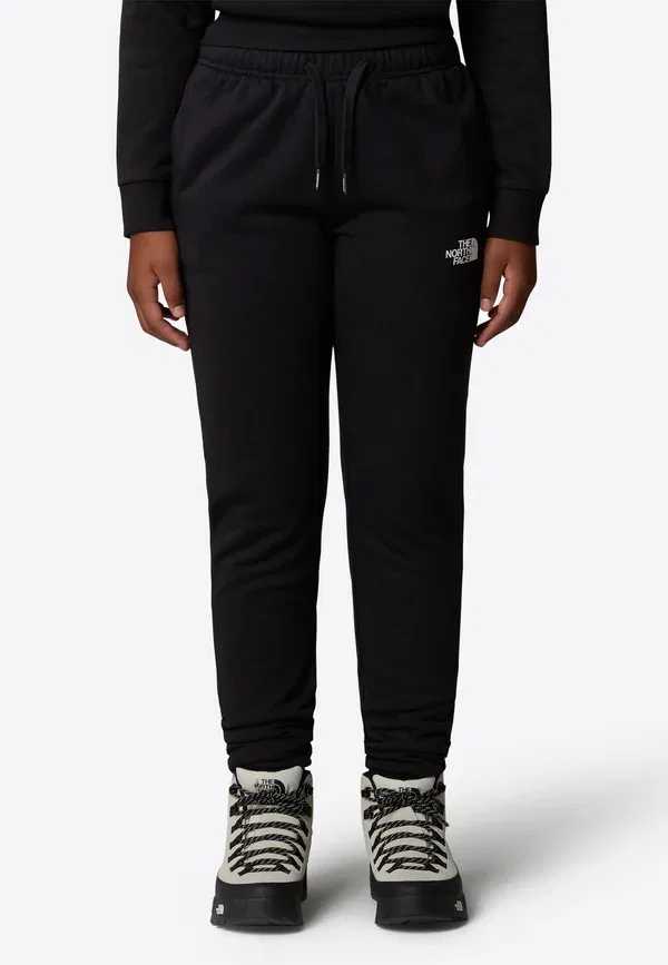Штаны спортивные зауженные The North Face, цвет черный — фото 4
