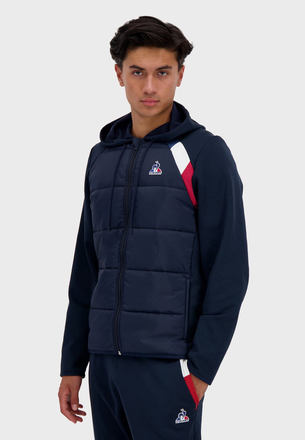 

Пуховик le coq sportif, синий
