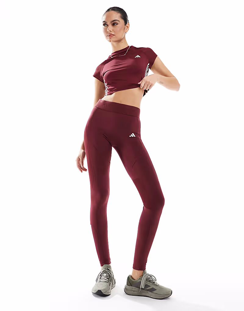 

Леггинсы Adidas Training Hyperglam Regular Length в бордовом цвете Adidas Performance