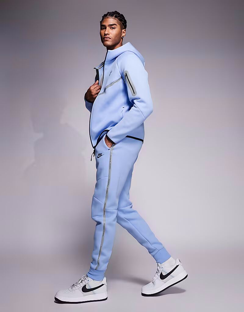 Светоотражающие спортивные брюки Tech Fleece светло-голубого цвета Nike — фото 3
