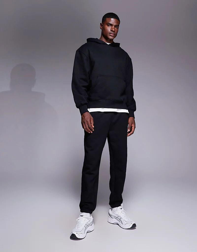

Премиальные плотные зауженные спортивные брюки ASOS DESIGN плотностью 400 г/м², черного цвета