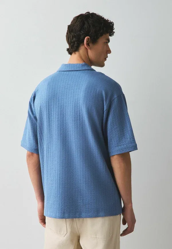Футболка поло Next, Regular fit seersucker trophy neck textured polo shirt, синий — фото 3
