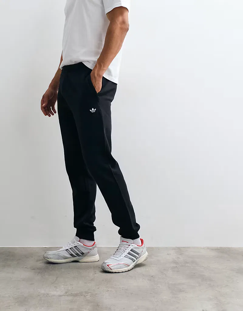 Спортивные брюки Adidas Originals Essential с манжетами, черный