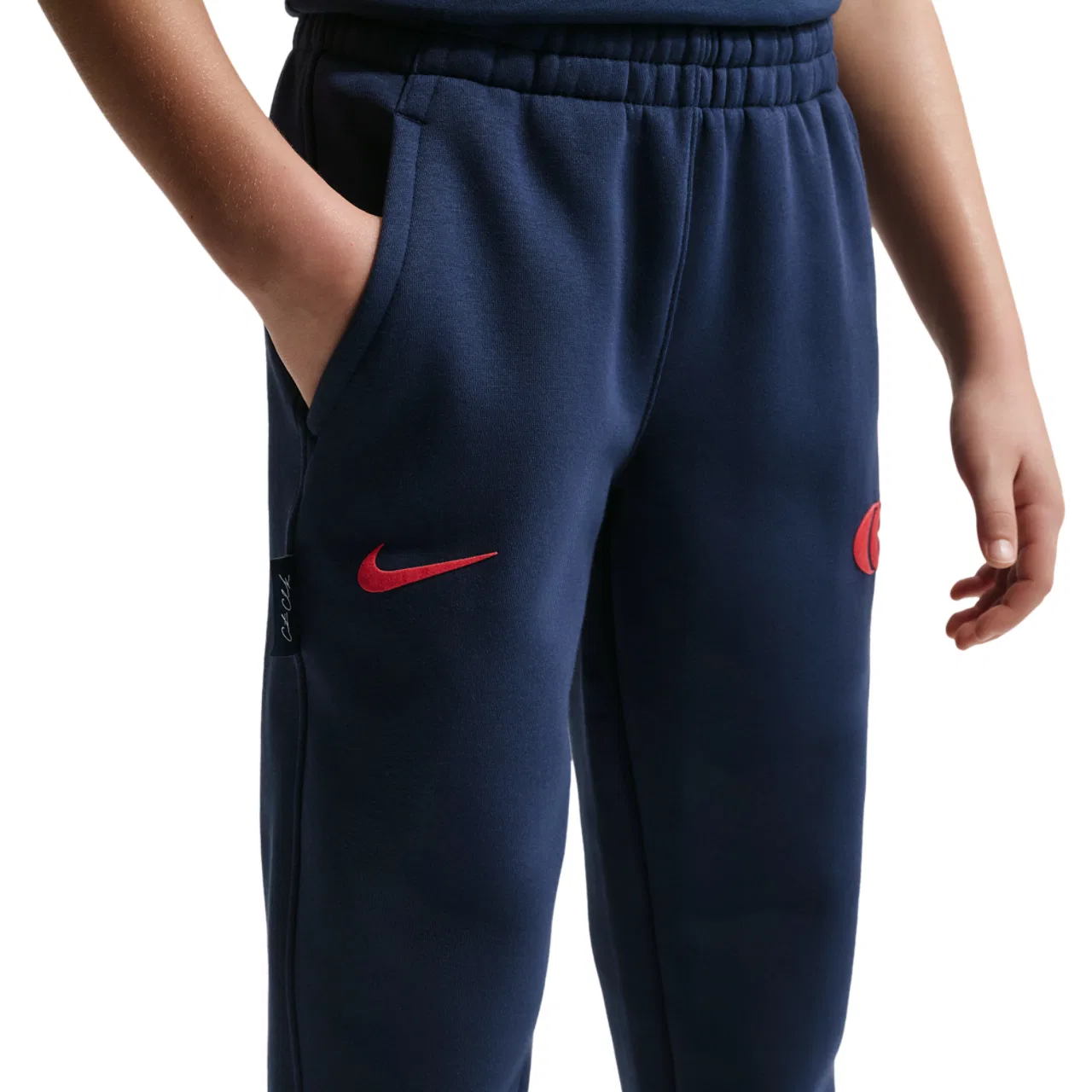 Брюки для мальчиков Caitlin Clark Essentials Fleece Nike, цвет Midnight Navy/University Red/University Red
