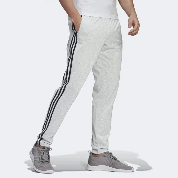 Спортивные длинные штаны с боковыми полосками Adidas, серый — фото 4
