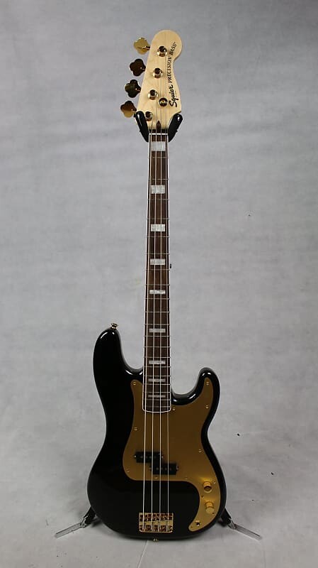 

Squier 40th Anniversary Precision Bass Gold Edition Laurel Fingerboard Gold Anodized Pickguard Black