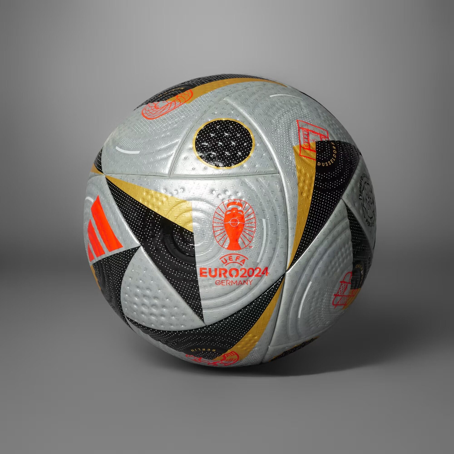 

Fussballliebe Finale Pro Мяч Adidas, цвет Silver Metallic/Gold Metallic/Black/Solar Red