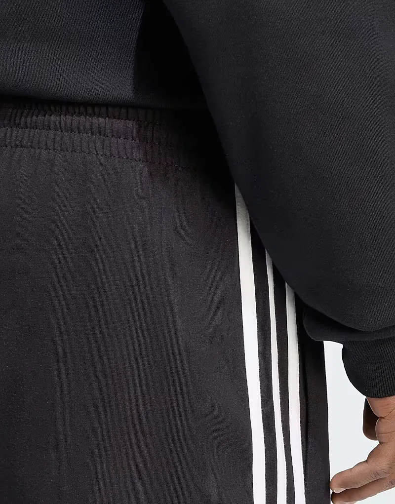 Трикотажные шорты Adidas Performance Essentials с тремя полосками, черно-белые — фото 3