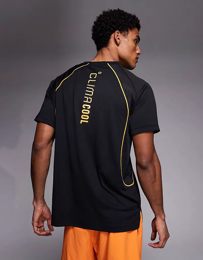 Тренировочная футболка Adidas Climacool в черно-оранжевом цвете — фото 3