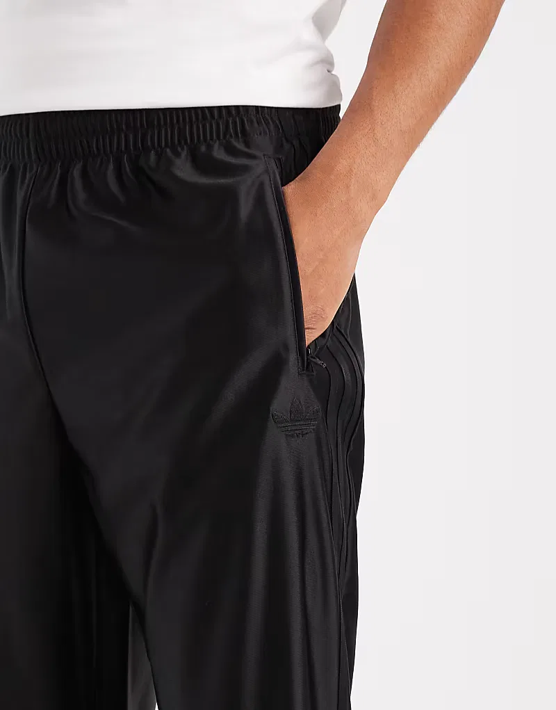 Спортивные брюки Adidas Originals Firebird с металлическим блеском, черный — фото 2