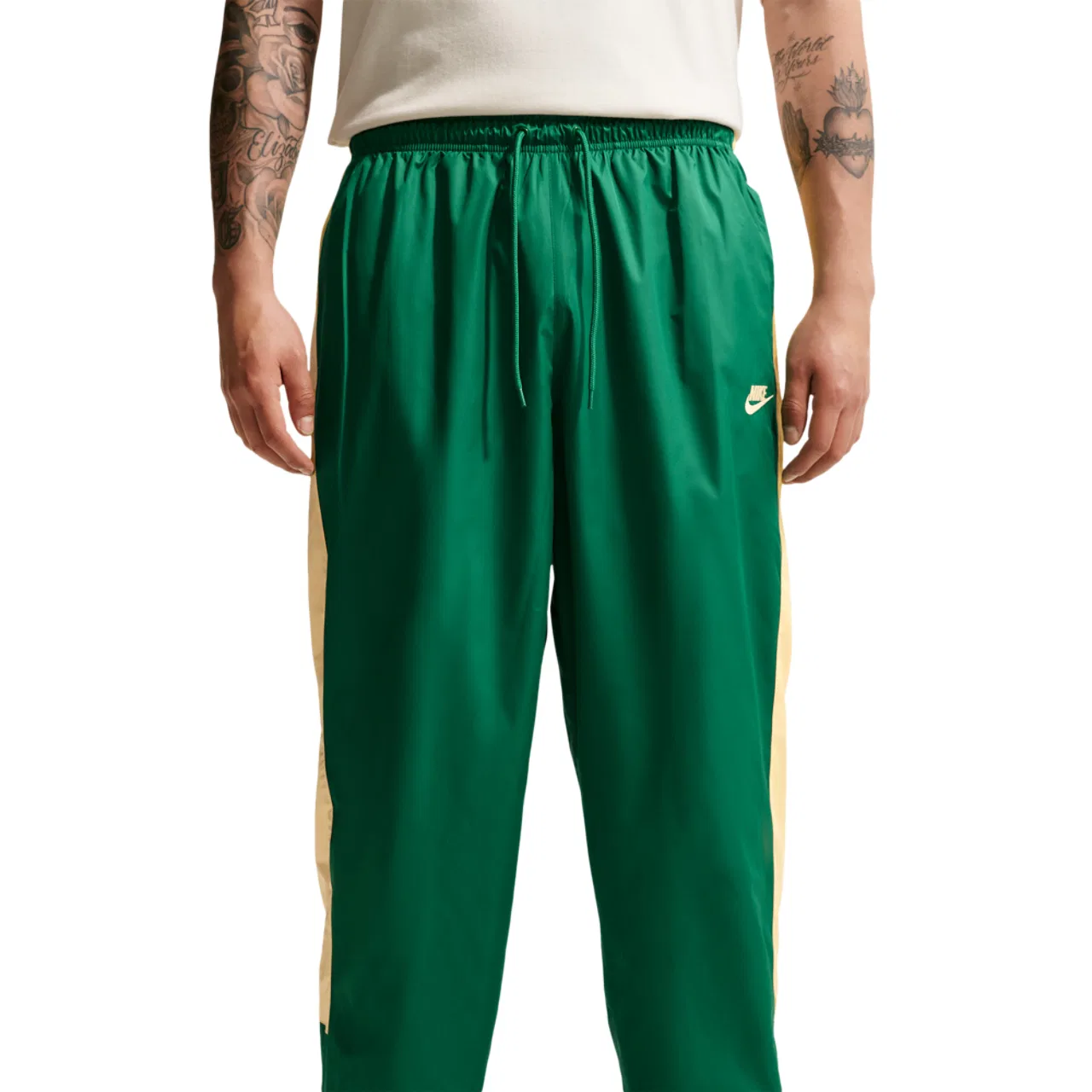 Мужские брюки Windrunner Nike, цвет Topaz Gold/Malachite/Topaz Gold