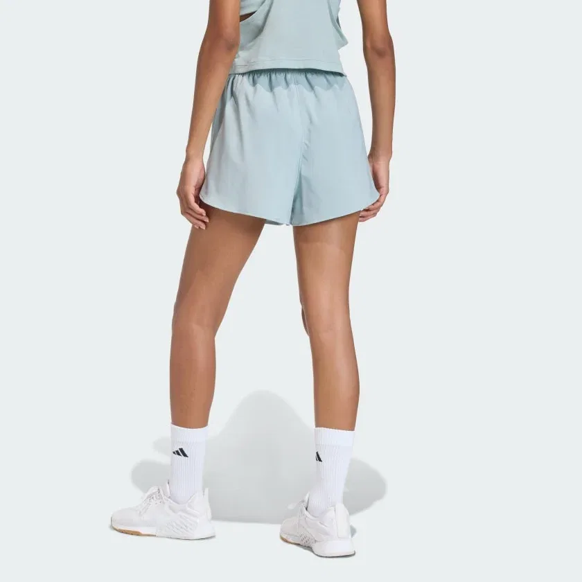 Женские спортивные шорты adidas с четырехсторонней эластичностью Wonder Sage — фото 2