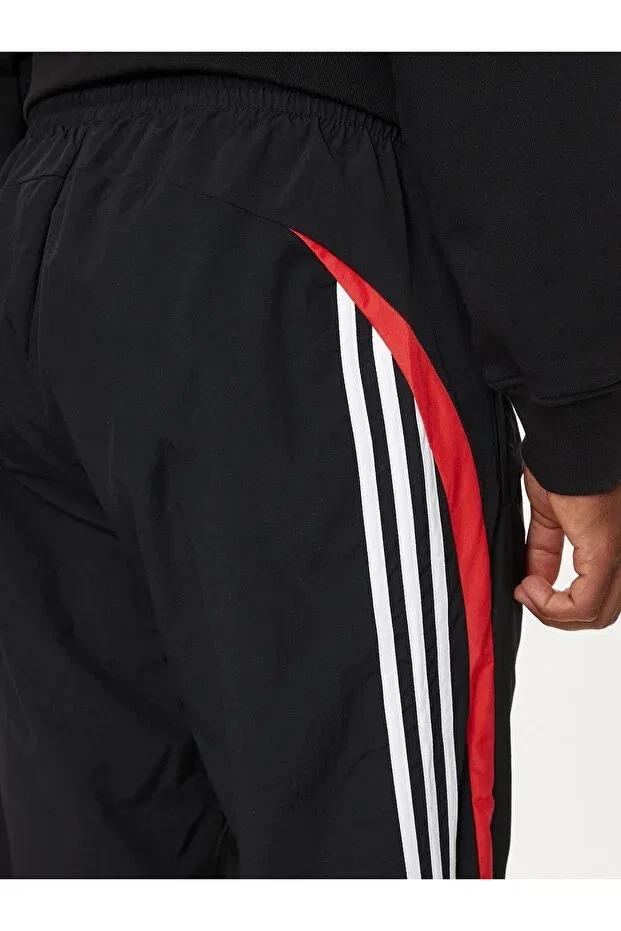 Мужские спортивные штаны с эластичным манжетом Adidas, Black — фото 4