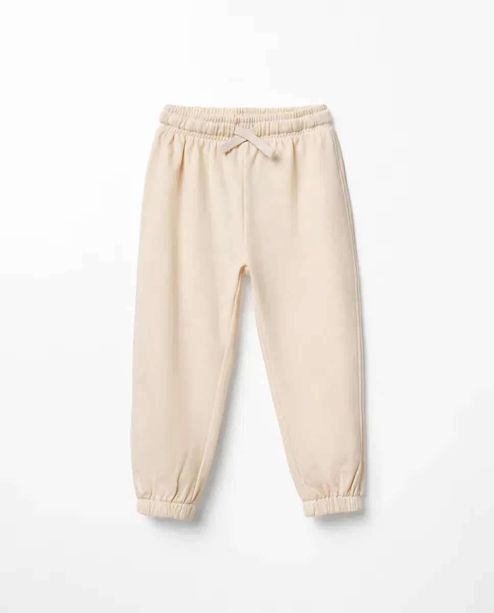 Детские штаны для девочек хлопковые Jogger liso Sfera, 120 Crudo