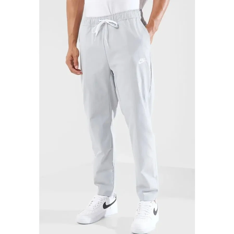 Спортивные брюки с зауженным кроем Nike Club Taper Leg, Серый