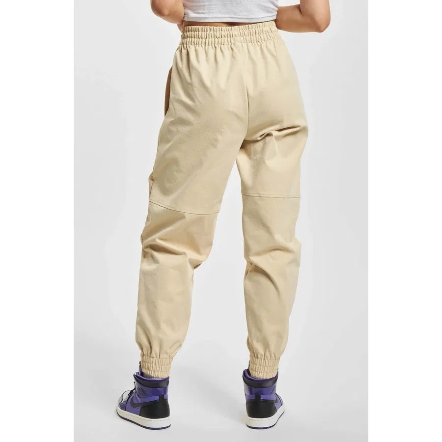 Женские спортивные штаны Nike Sportswear Swoosh Woven, свободный крой, с эластичными манжетами, Желтый — фото 3