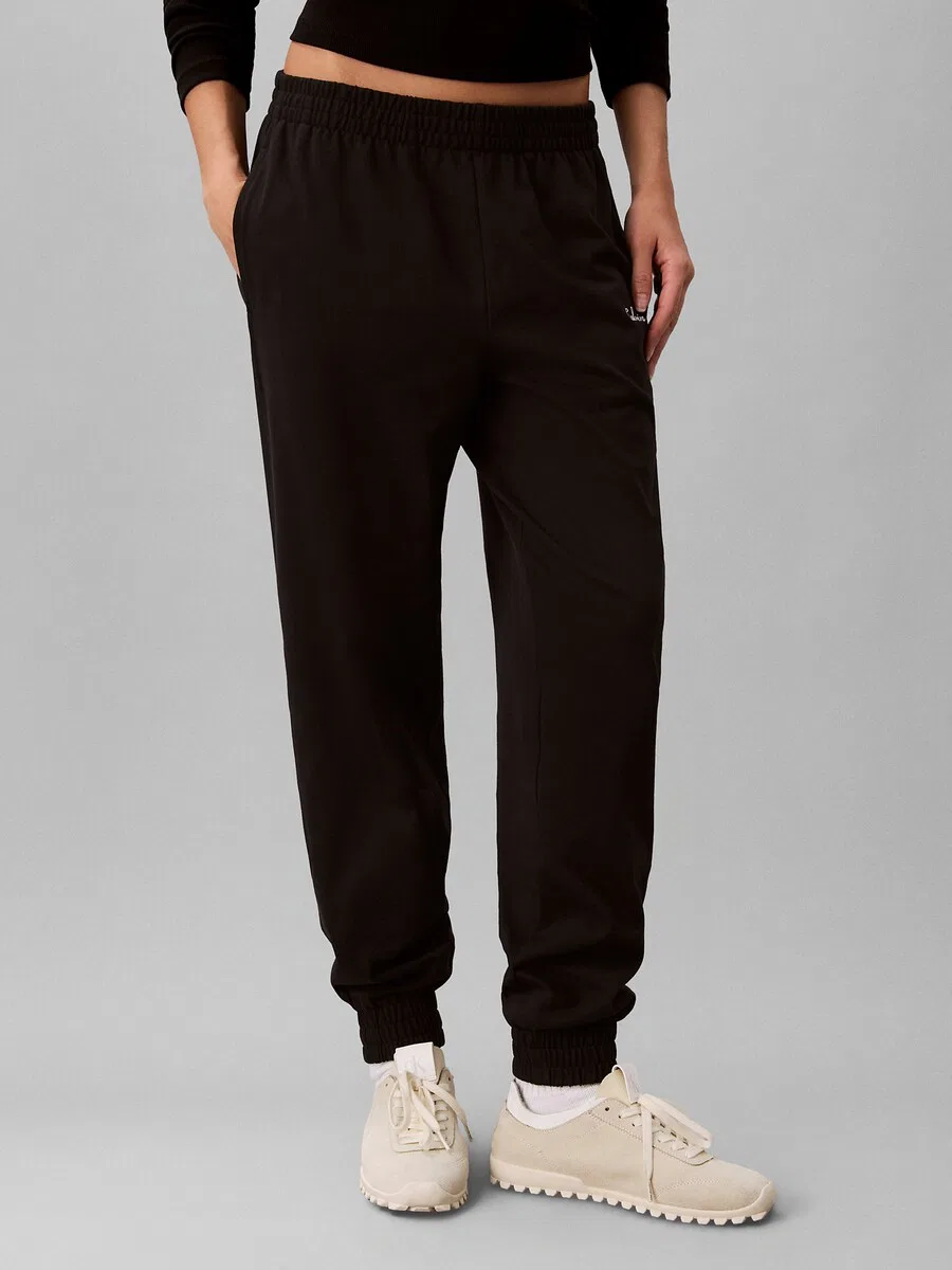 Зауженные брюки Calvin Klein со складками спереди, черные — фото 2