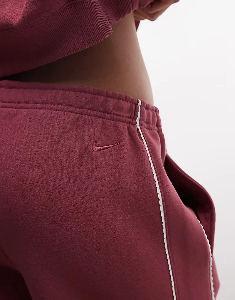 Спортивные брюки Nike Studio Fleece средней плотности с волнистым краем, розовый — фото 2