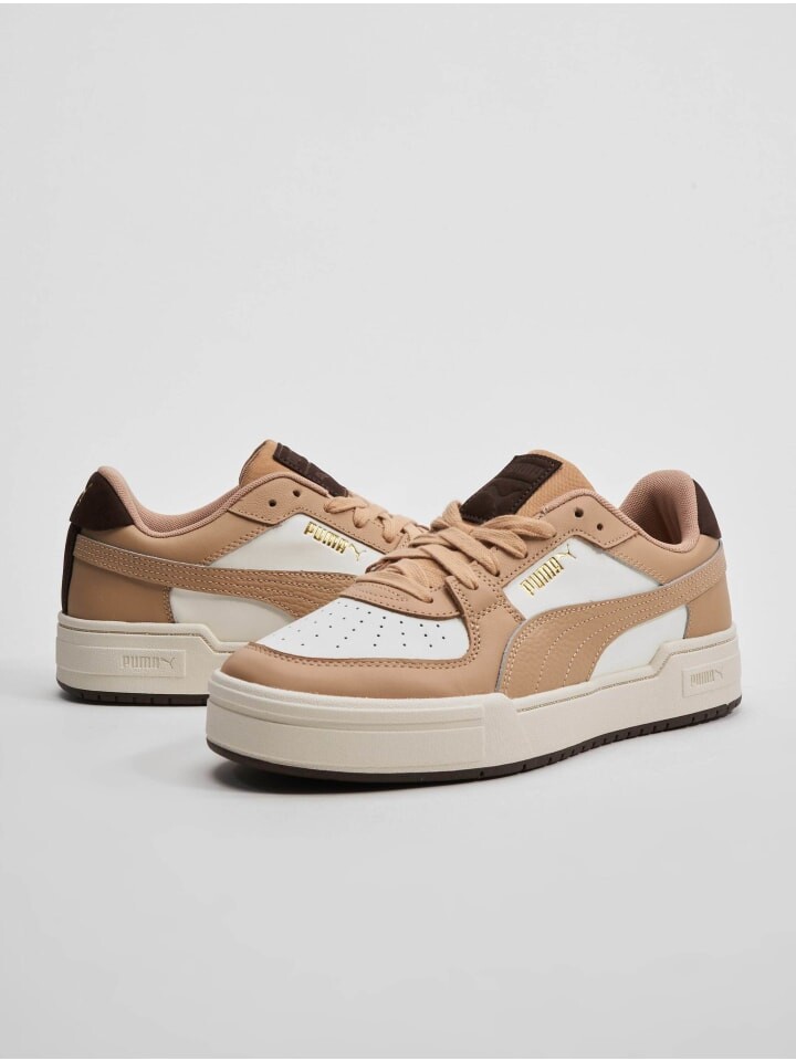 

Кроссовки на шнуровке Puma, белый