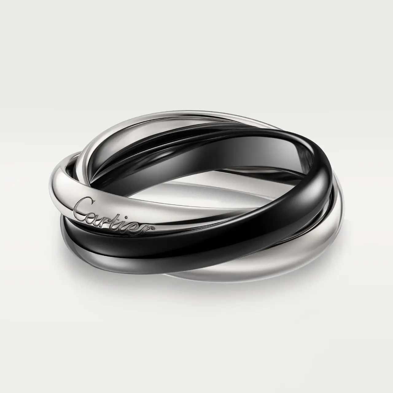 

Кольцо Cartier Classic Trinity, белое золото/черная керамика