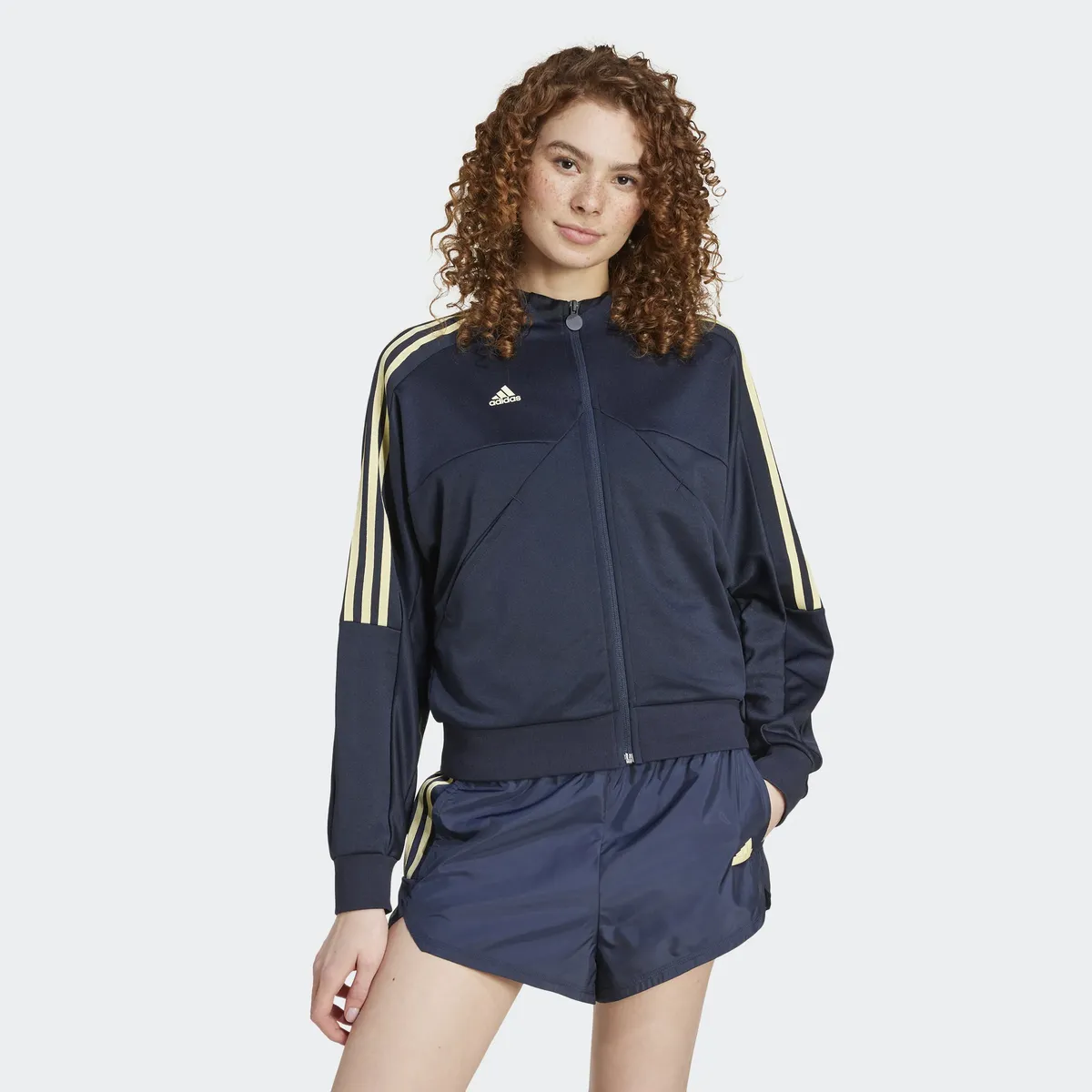 

Спортивная куртка Adidas Sportswear "W TIRO CB TT", цвет Legend Ink / Almost Yellow