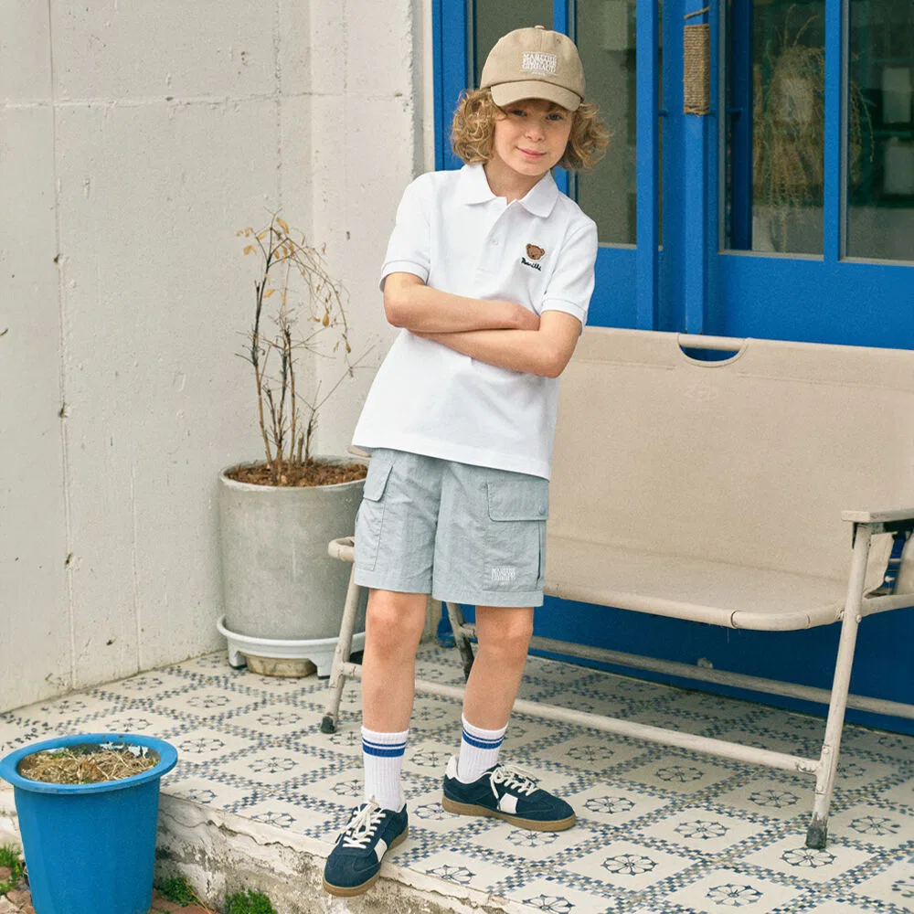 Детские нейлоновые шорты Enfant с классическим логотипом светло-голубые от Marithé Kids