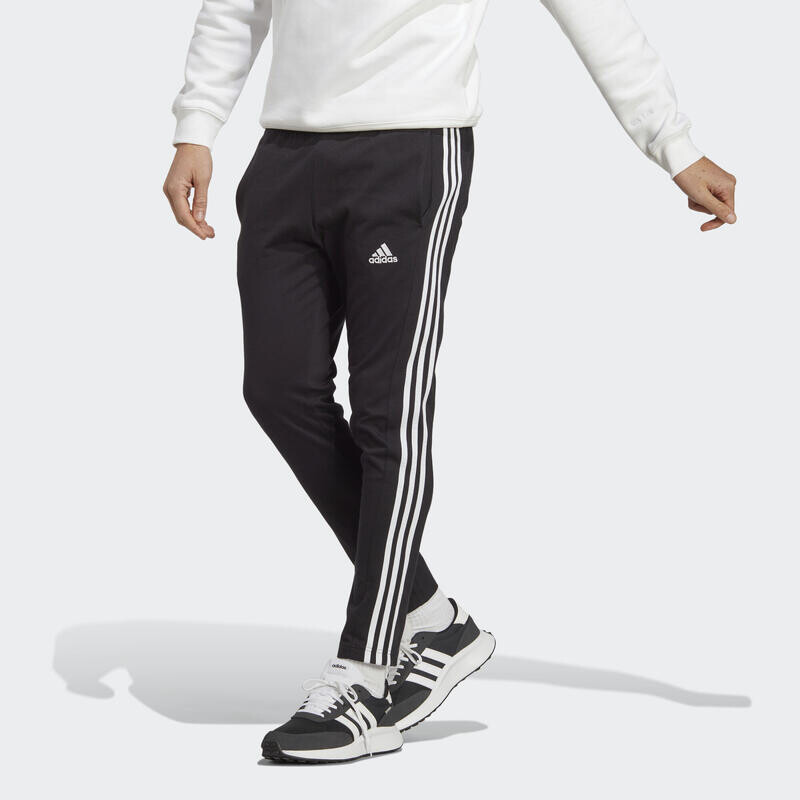 

Брюки Essentials из одного трикотажа с зауженным открытым краем и тремя полосками ADIDAS, цвет schwarz