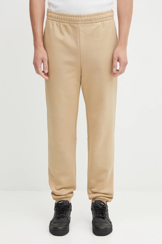 

Хлопковые спортивные штаны Lacoste, бежевый