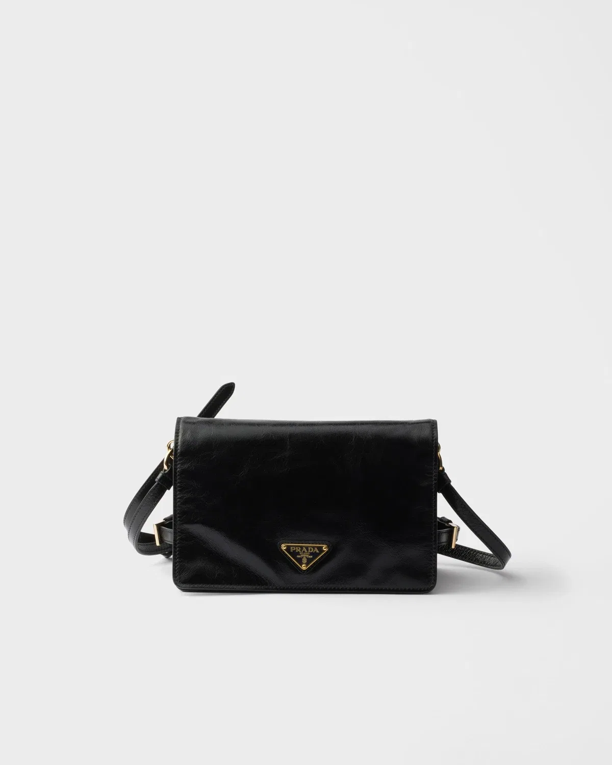 Мини-сумка на плечо из кожи Prada, черный