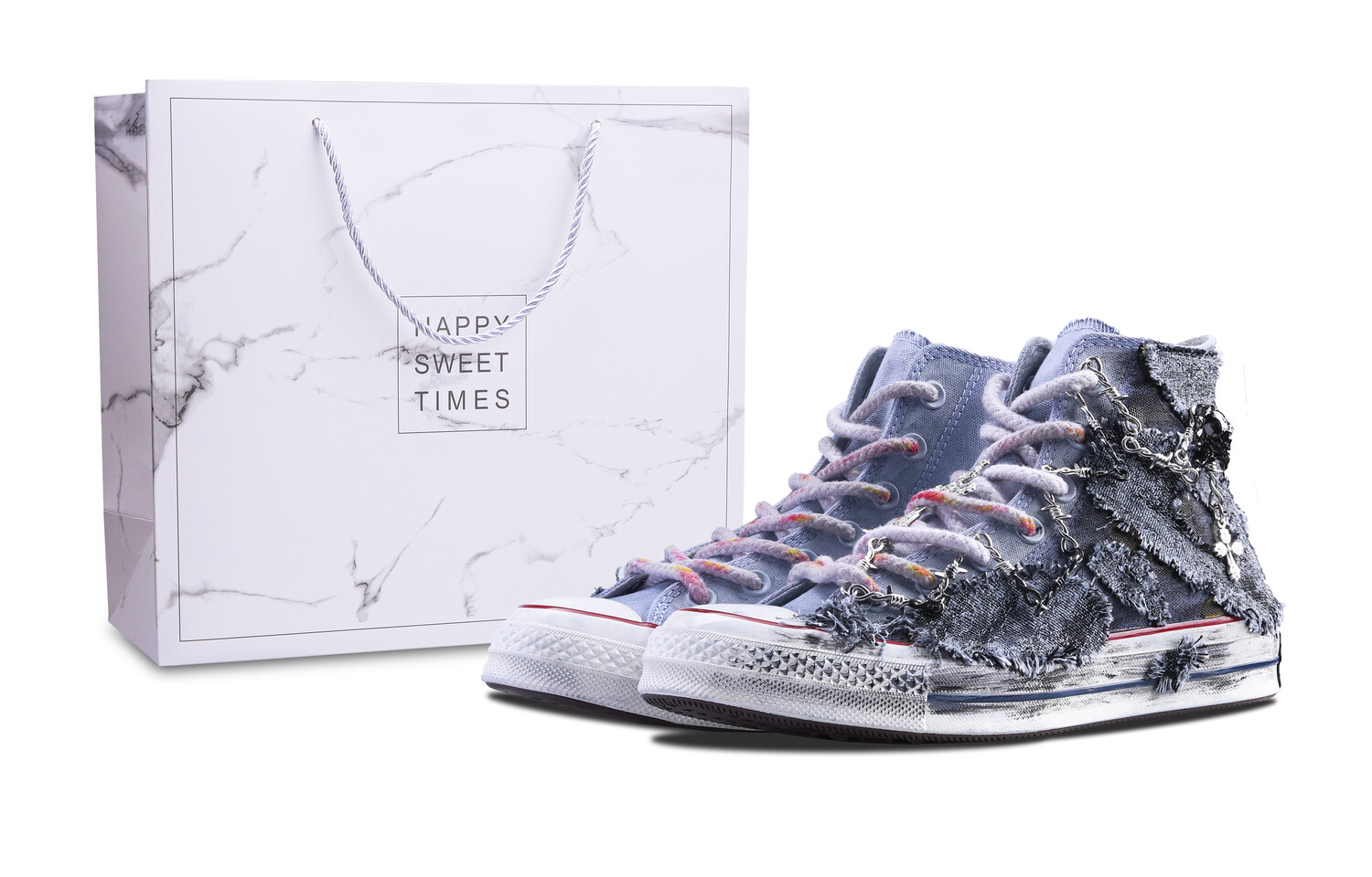 

1970-е годы. Кеды унисекс с высоким берцем, серые/черные. Converse