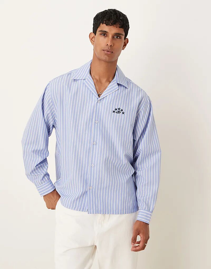 

Рубашка свободного кроя ASOS DESIGN с длинными рукавами и вышивкой из хлопка в сине-белую полоску