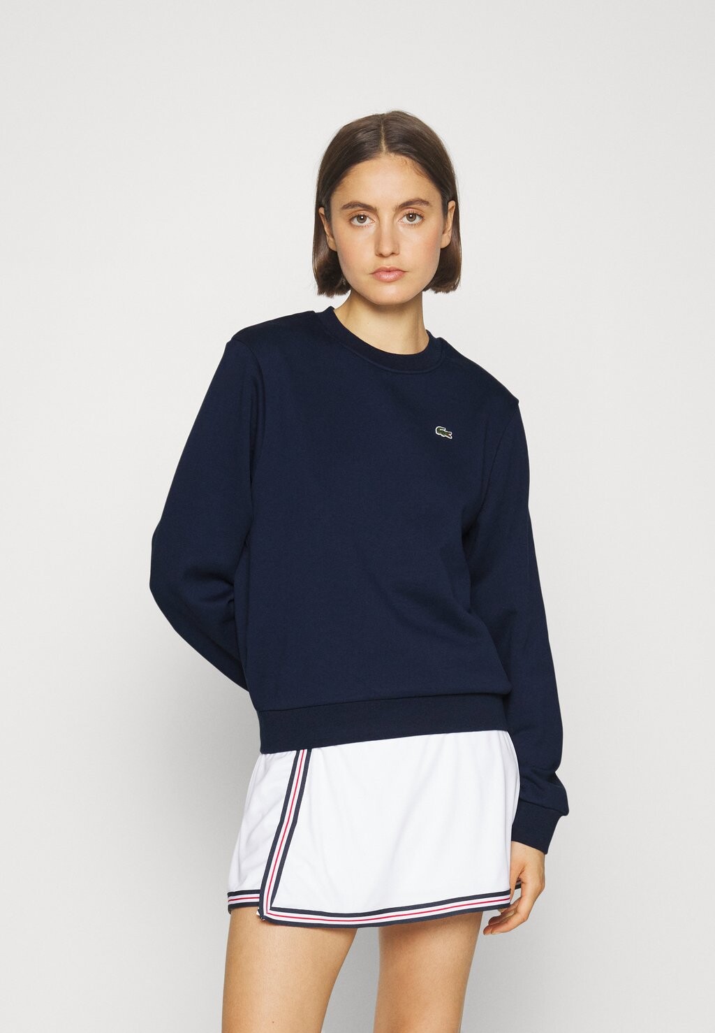 

Свитшот женский Lacoste с логотипом бренда, темно-синий