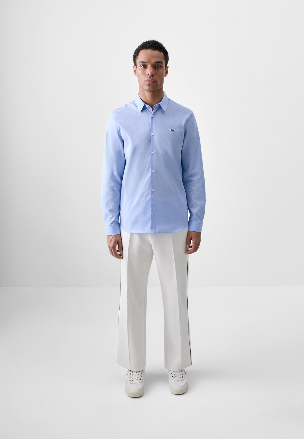 

Брюки Lacoste, кремовый