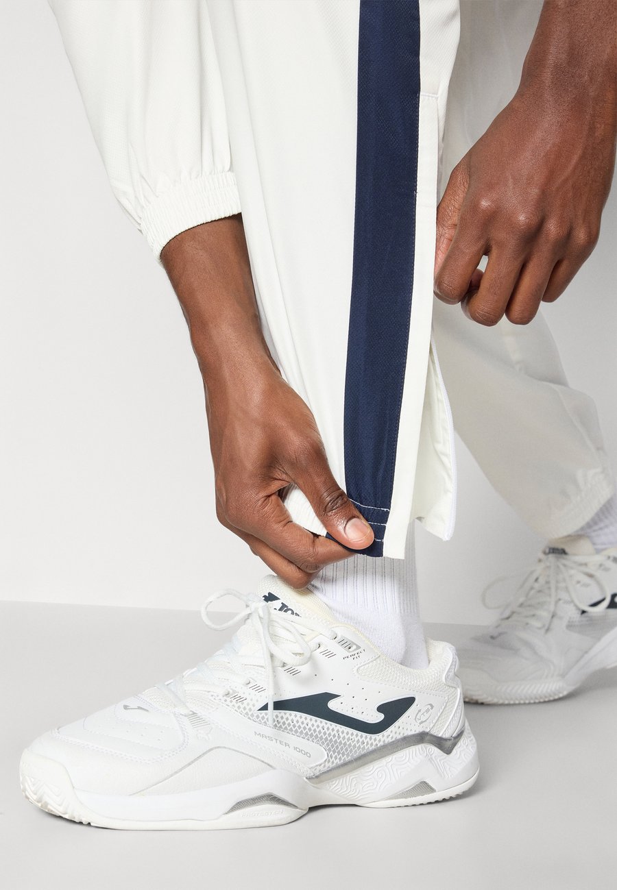 Спортивный костюм Lacoste Sport TENNIS TRACKSUIT SET, Flour/Navy Blue/Green/Off-White — фото 4