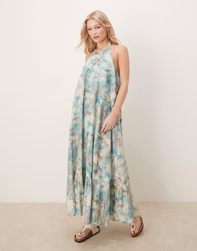 

Платье макси ASOS DESIGN с халтером, оборками по низу и размытым цветочным принтом