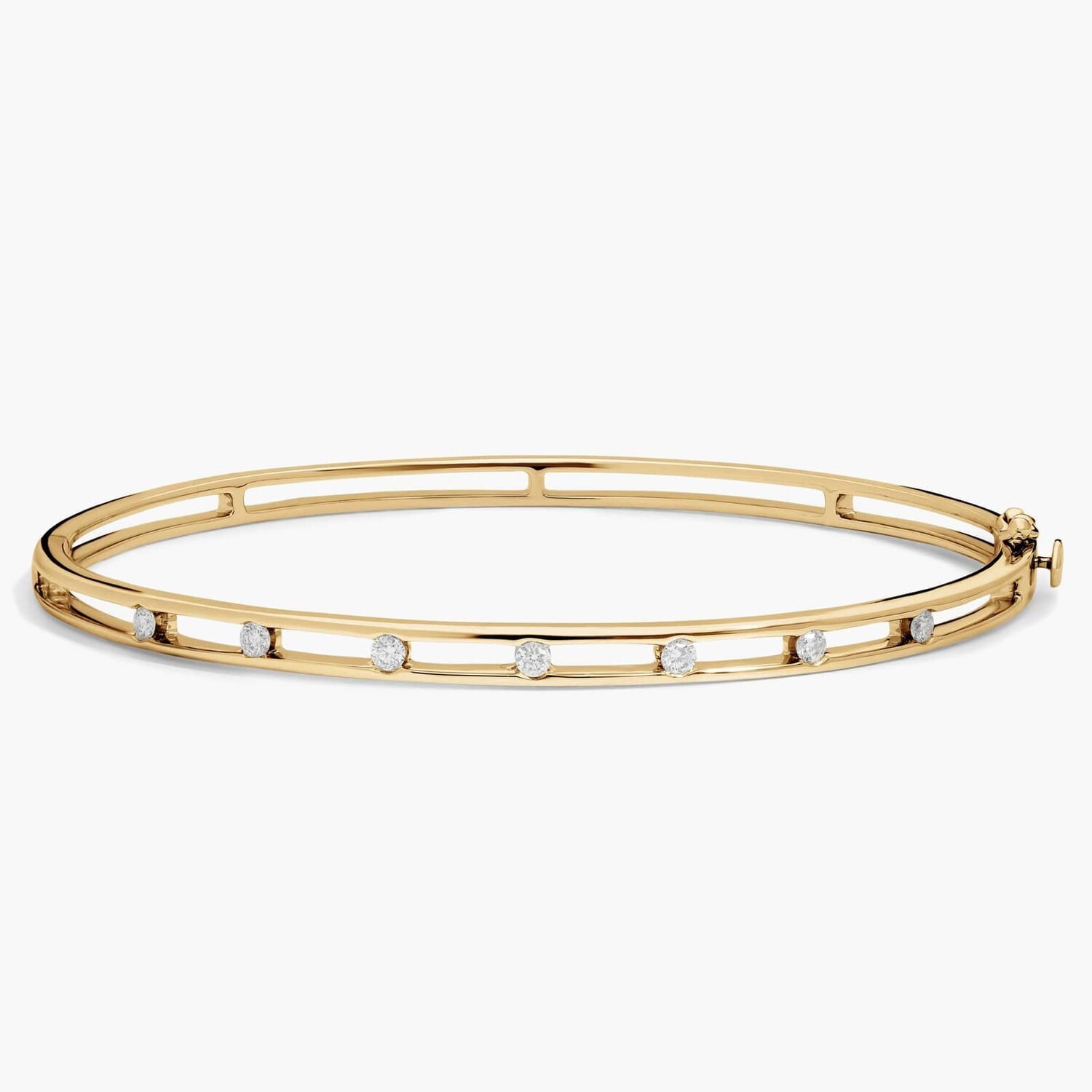 

Браслет Diamond Station Bangle из 14-каратного желтого золота (1/4 карата). Blue Nile