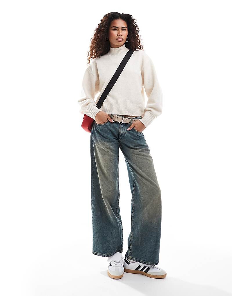 

Monki – бежевый меланжевый свитер с высоким воротником